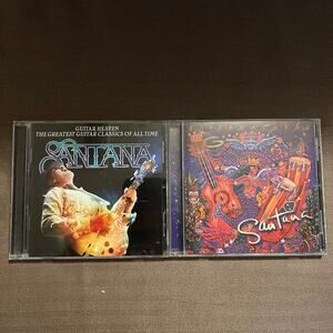 2 Santana CDs Guitar Heaven: Greatest Classics of All Time and Supernatural.